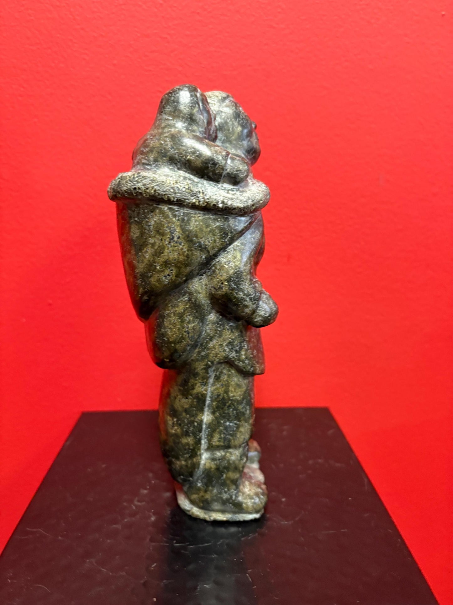 Fabulous signed indigenous Inuit  soapstone statue of a man and child   9 inches tall  great condition and detail  Inuit art