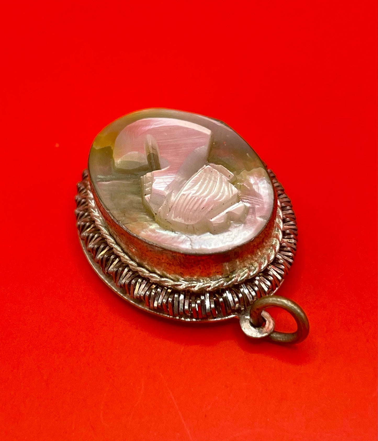 1 inch long Carved abalone shell pendant  lovely