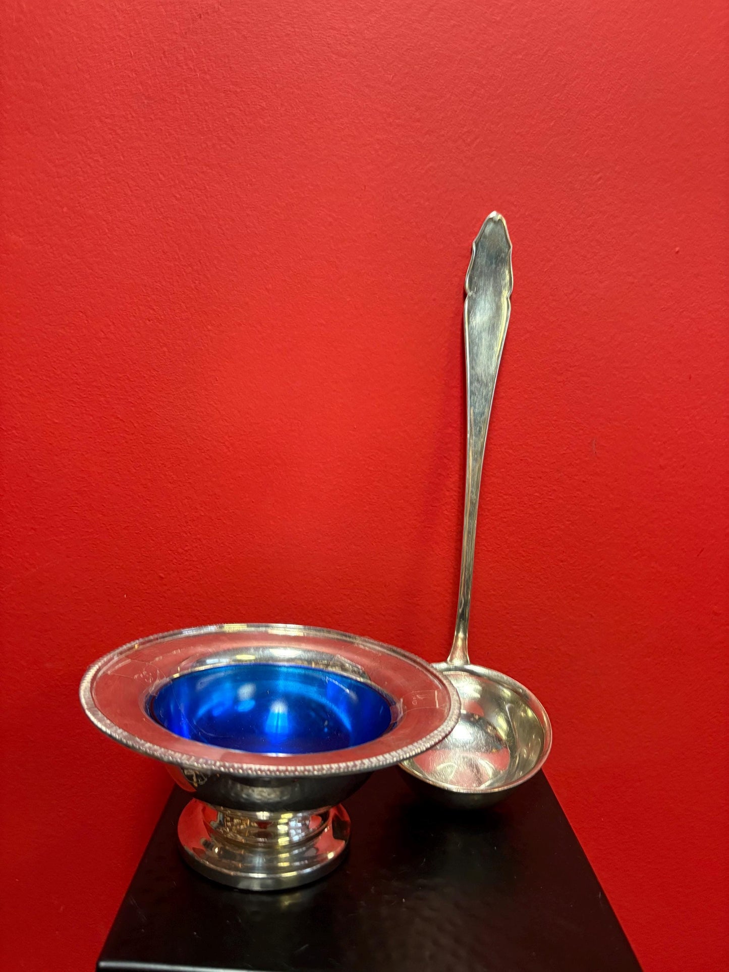 Antique silver plated ladle and bowl with cobalt blue liner  ladle 12 inches long and bowl 6 inches across great deal for both