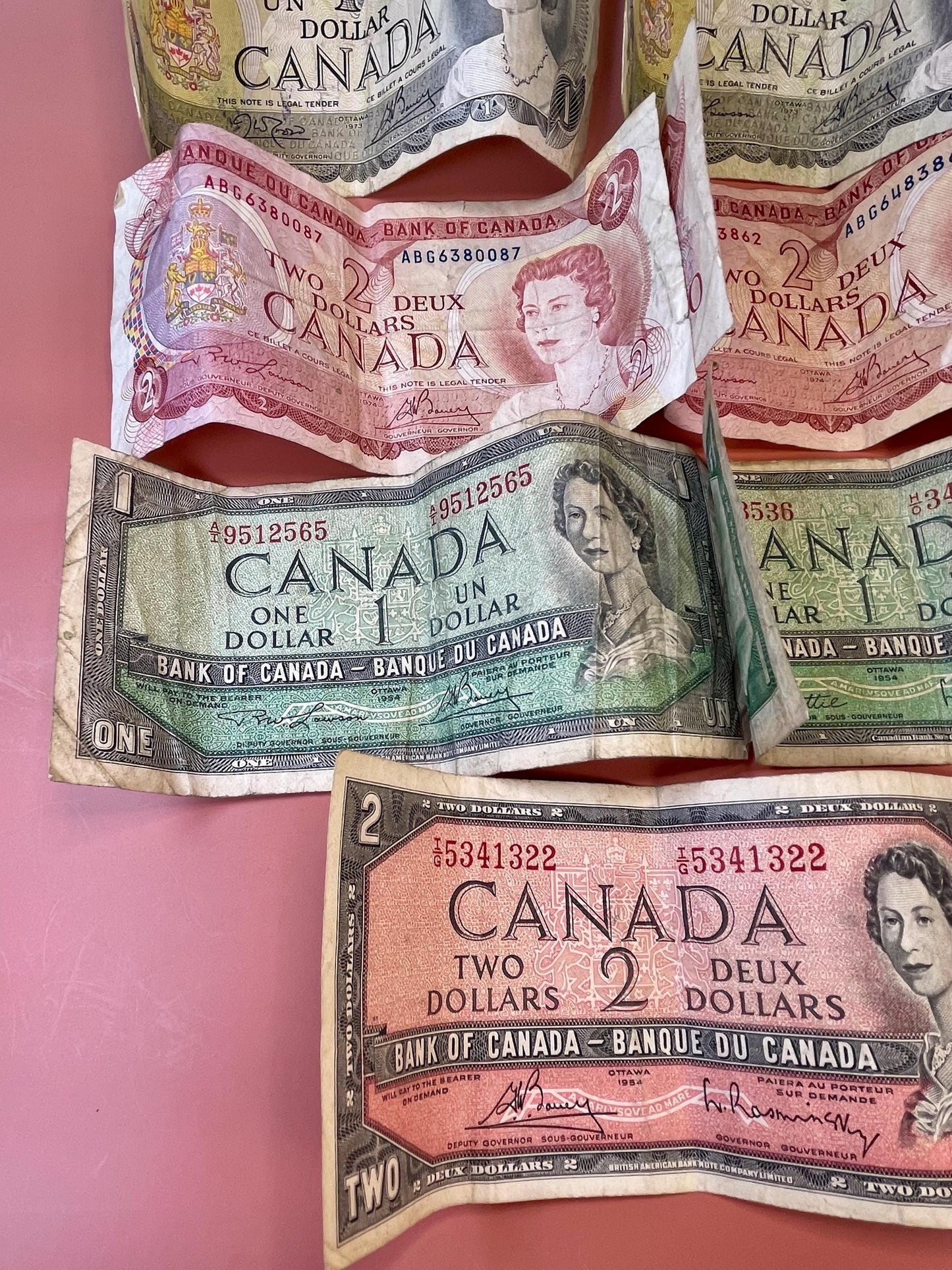 Old Canadian currency One and Two Dollar Bills