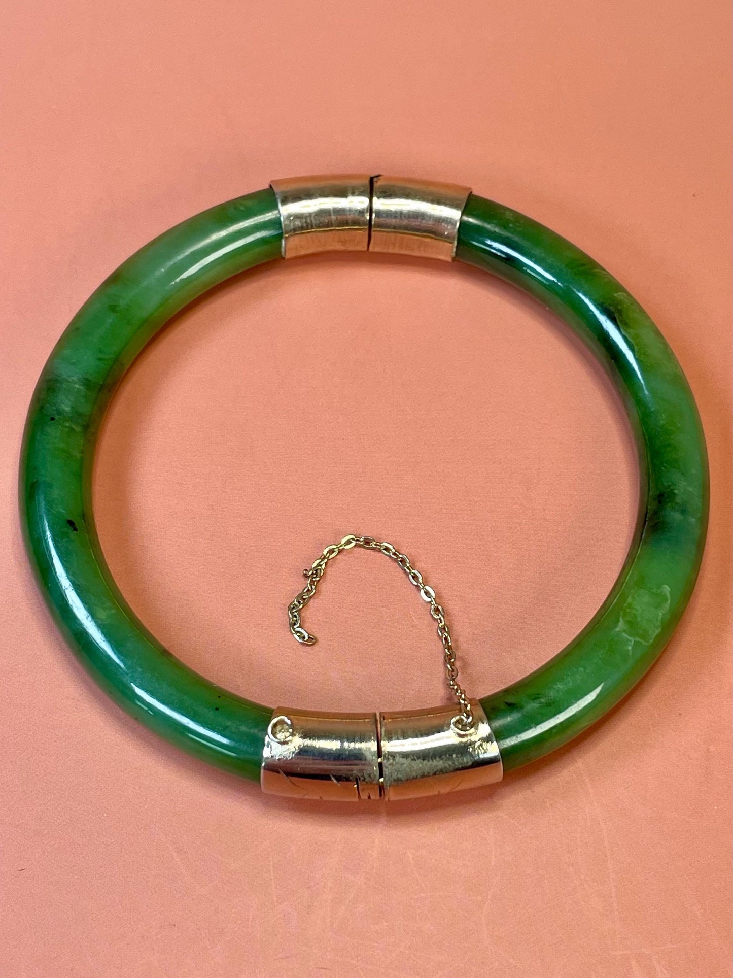 Lovely jade and gold toned bangle  value priced  2.5 inches inside