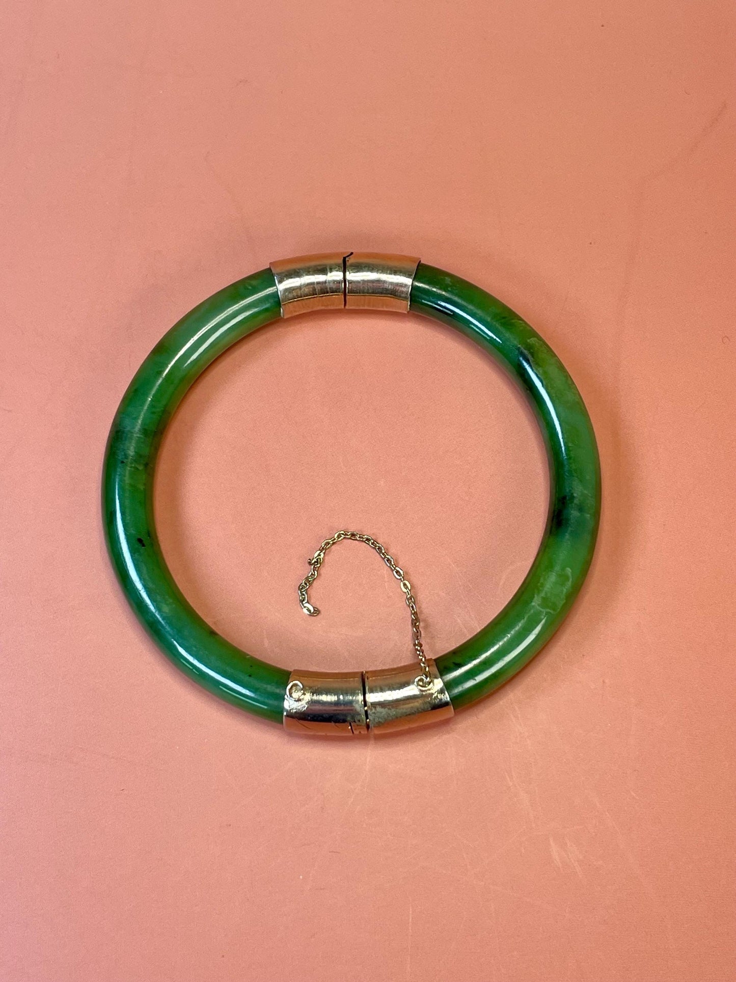 Lovely jade and gold toned bangle  value priced  2.5 inches inside