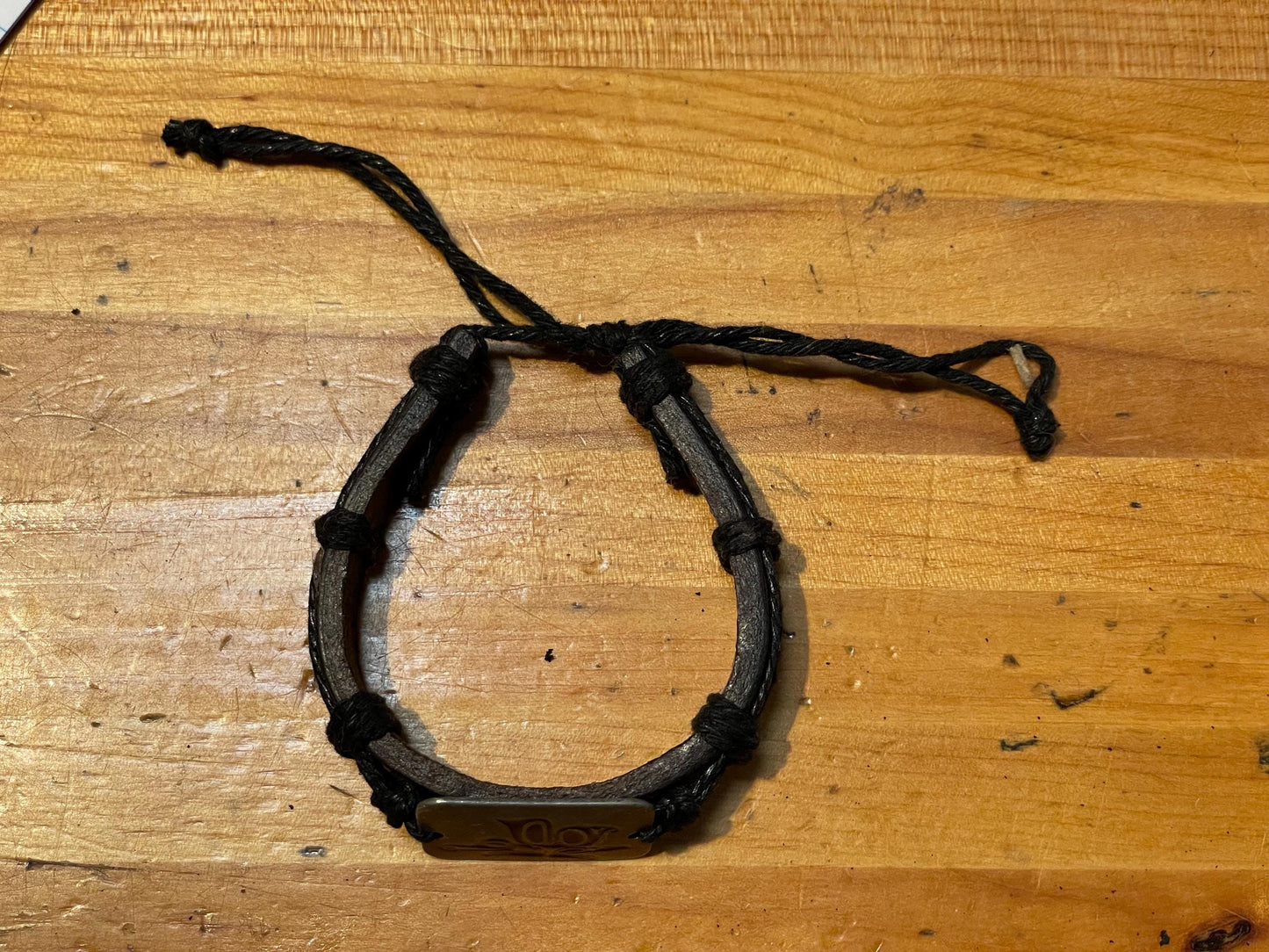 Handcrafted Leather Bracelet with Tribal Butterfly Design