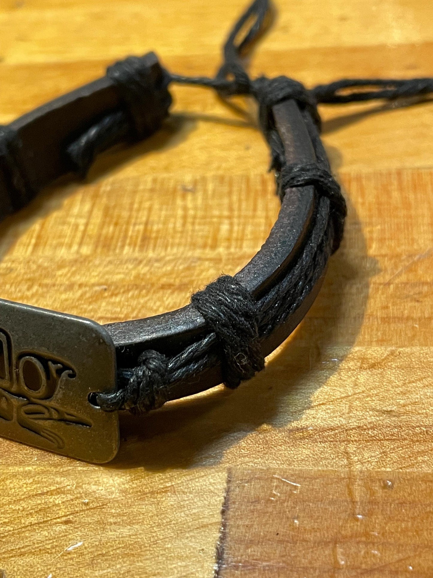 Handcrafted Leather Bracelet with Tribal Butterfly Design