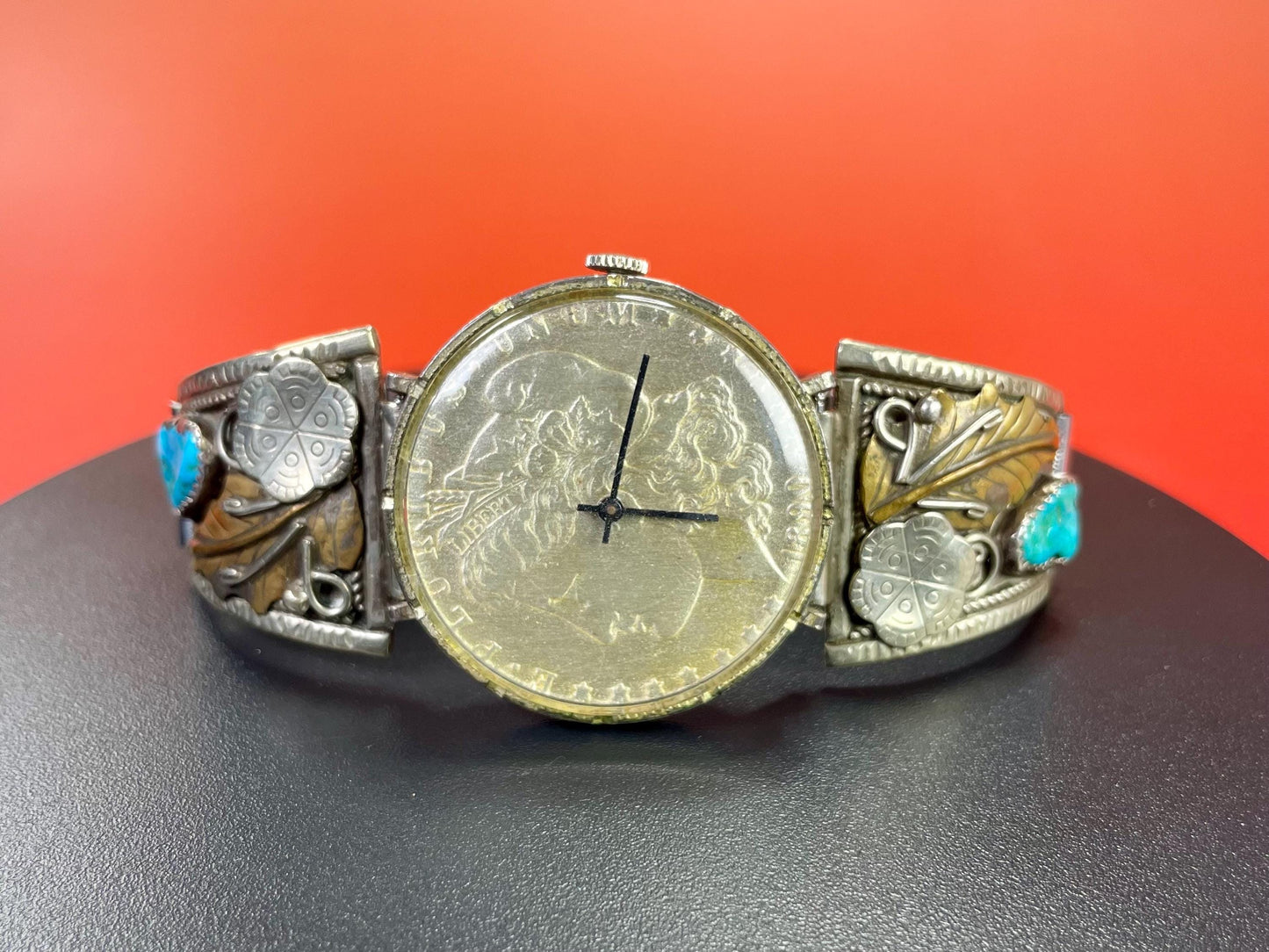 Lovely Navajo watch with coin face and expandible band  sold as is  good project and great value