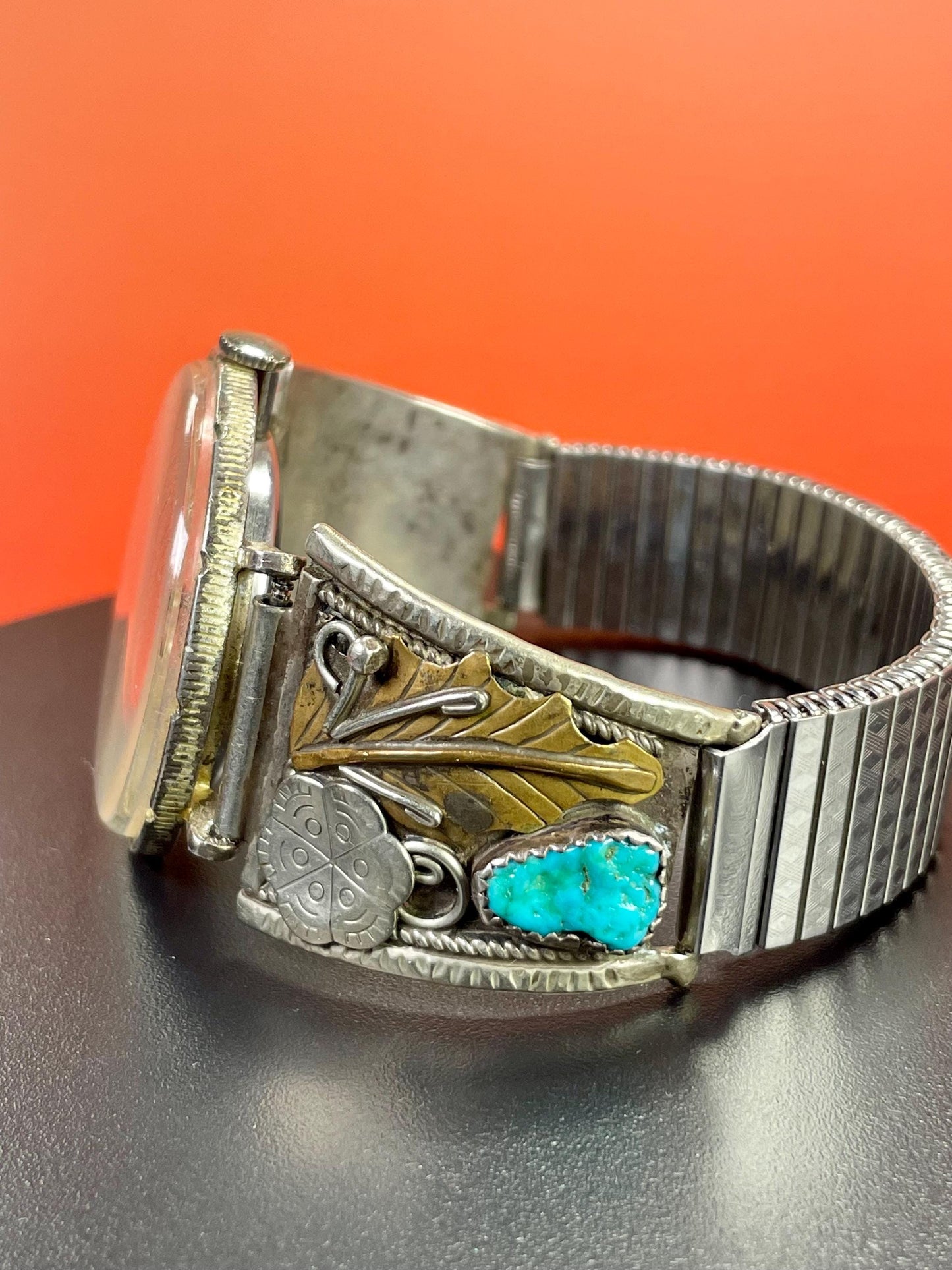 Lovely Navajo watch with coin face and expandible band  sold as is  good project and great value