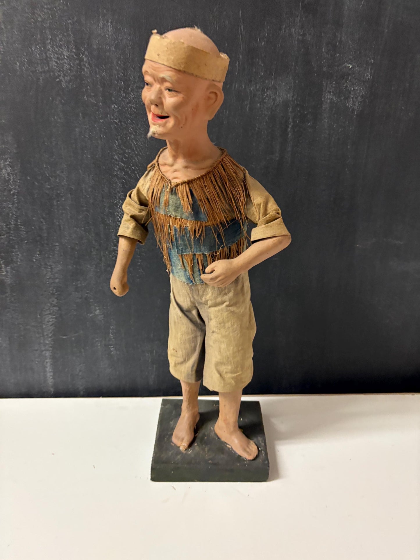 Stunning Chinese  18th century porcelain newspaper, straw and cloth statue of a man on wood stand  wow - 15 inches tall