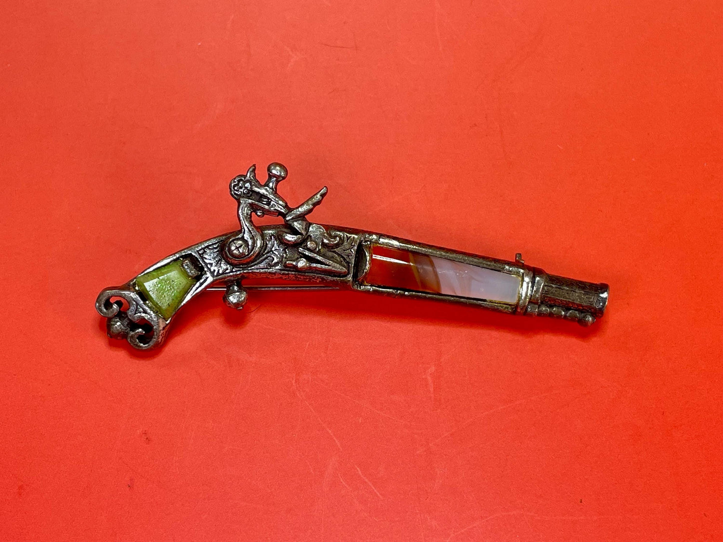 3.25 inch Wide Vintage Gemstone Gun brooch  good condition and great gift