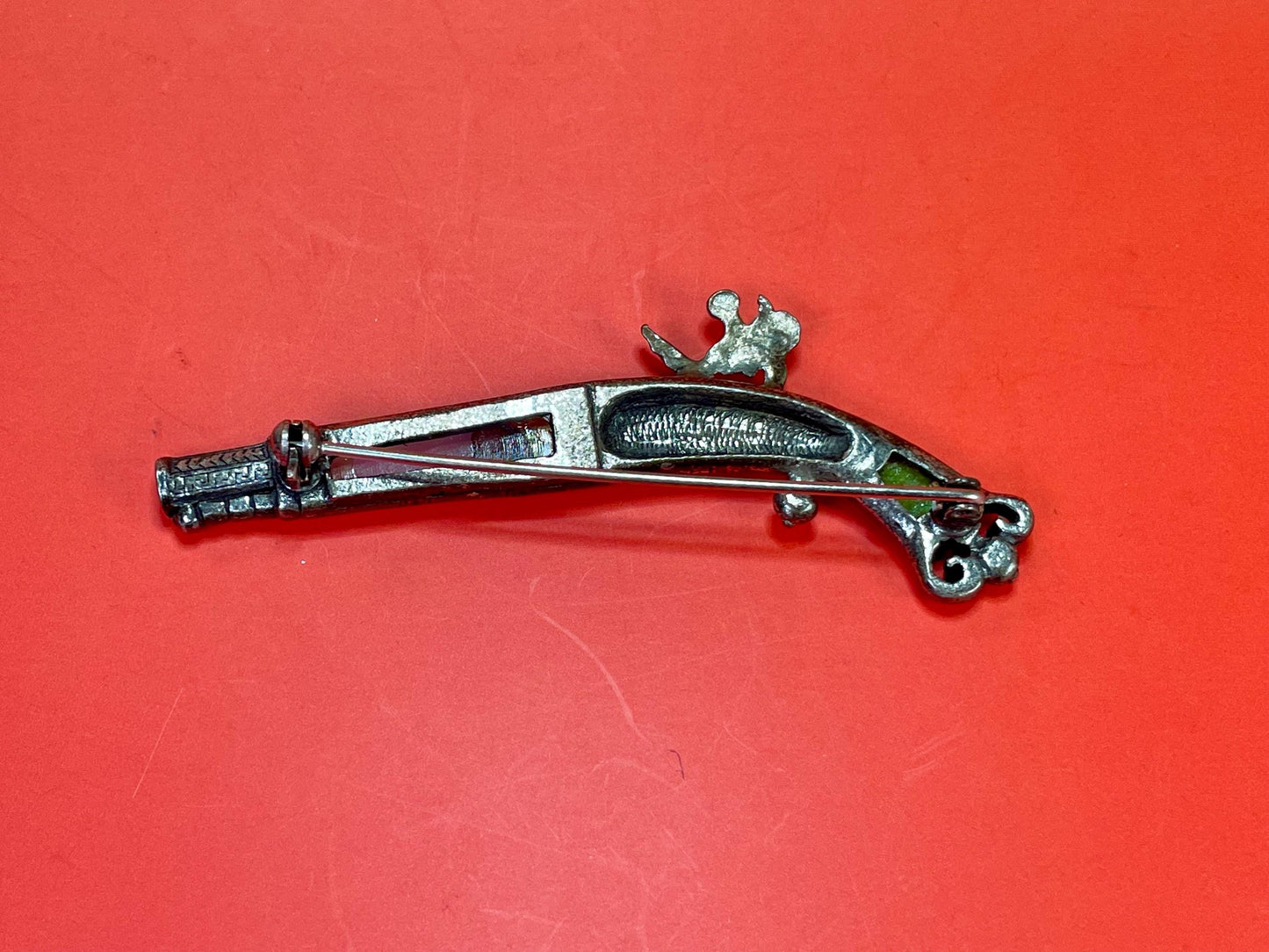 3.25 inch Wide Vintage Gemstone Gun brooch  good condition and great gift