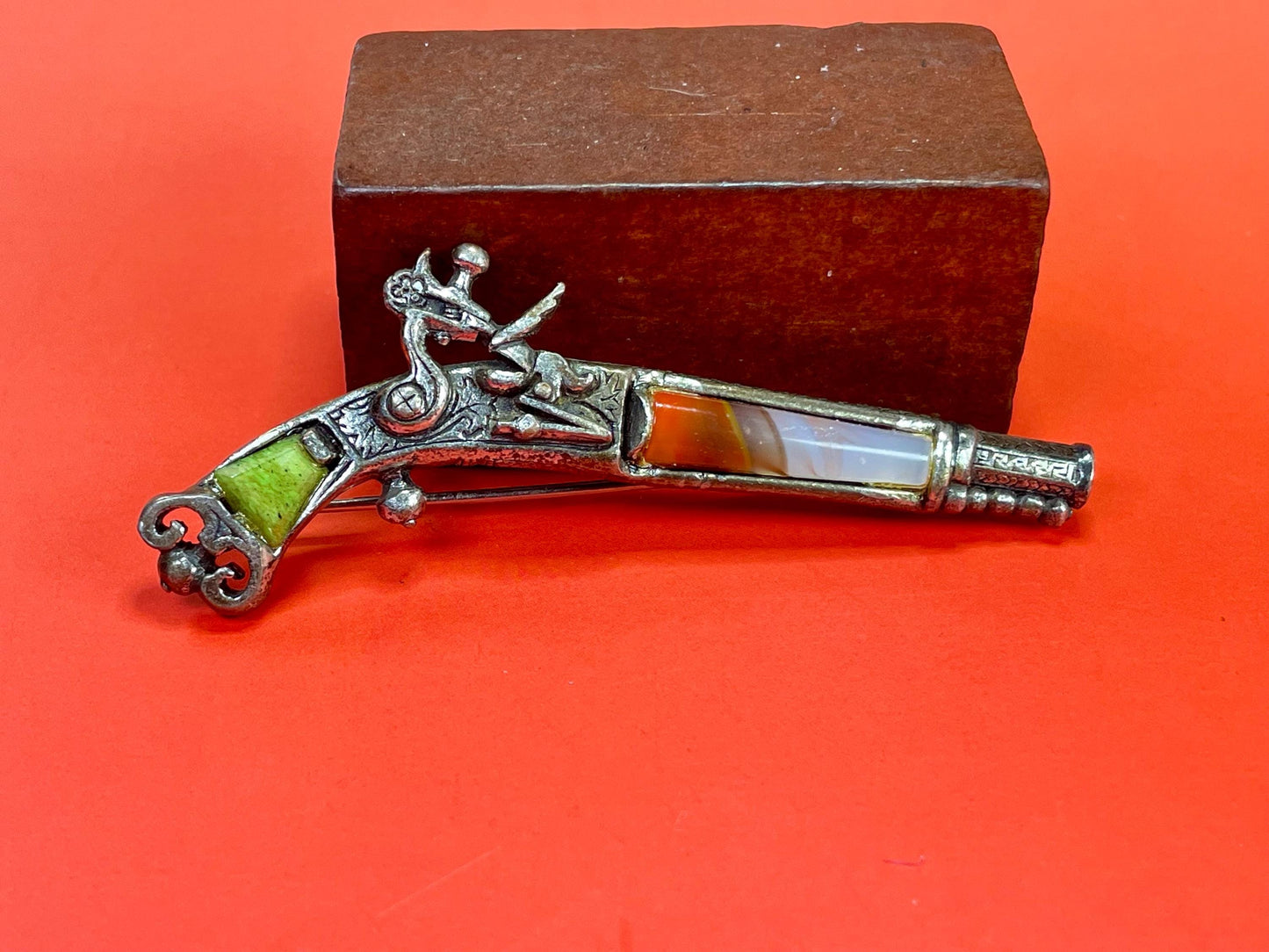 3.25 inch Wide Vintage Gemstone Gun brooch  good condition and great gift