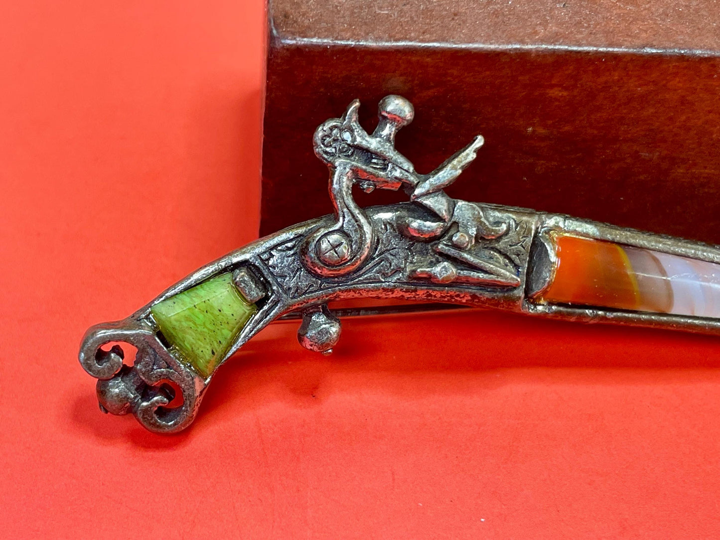 3.25 inch Wide Vintage Gemstone Gun brooch  good condition and great gift