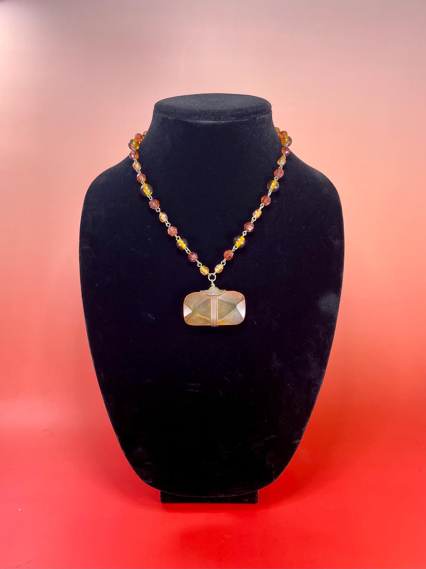 Unusual Amber Coloured pendant with Beaded necklace