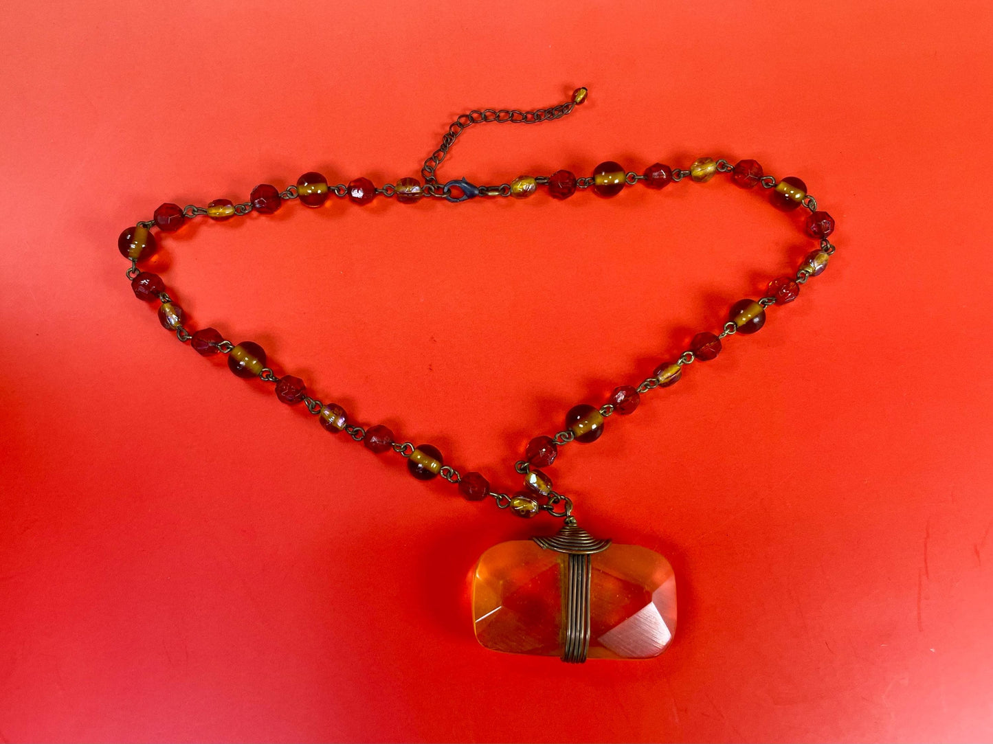 Unusual Amber Coloured pendant with Beaded necklace