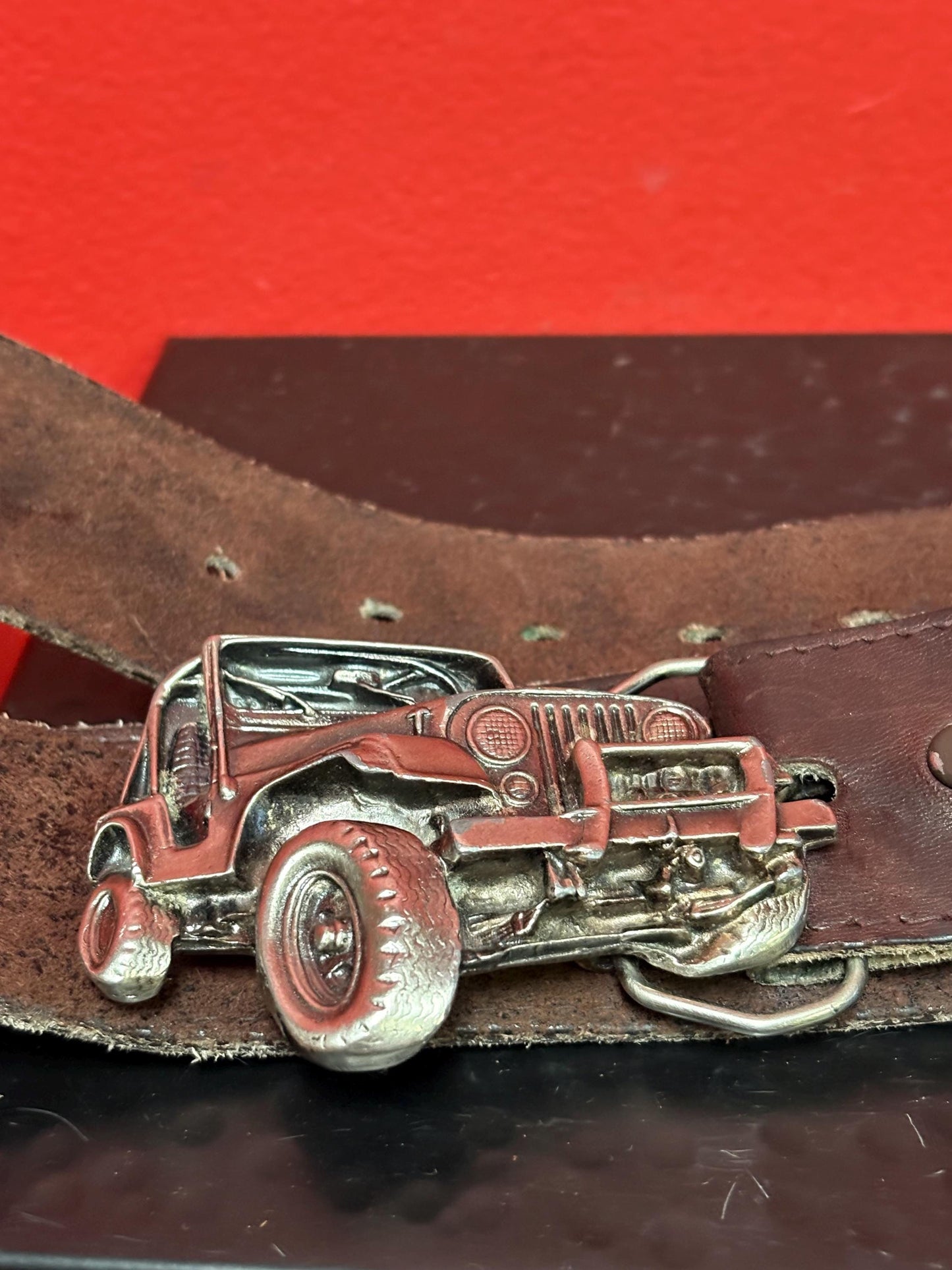 Very cool American Jeep 3 inch belt buckle in heavy metal with approximately 40 inch long vintage leather belt