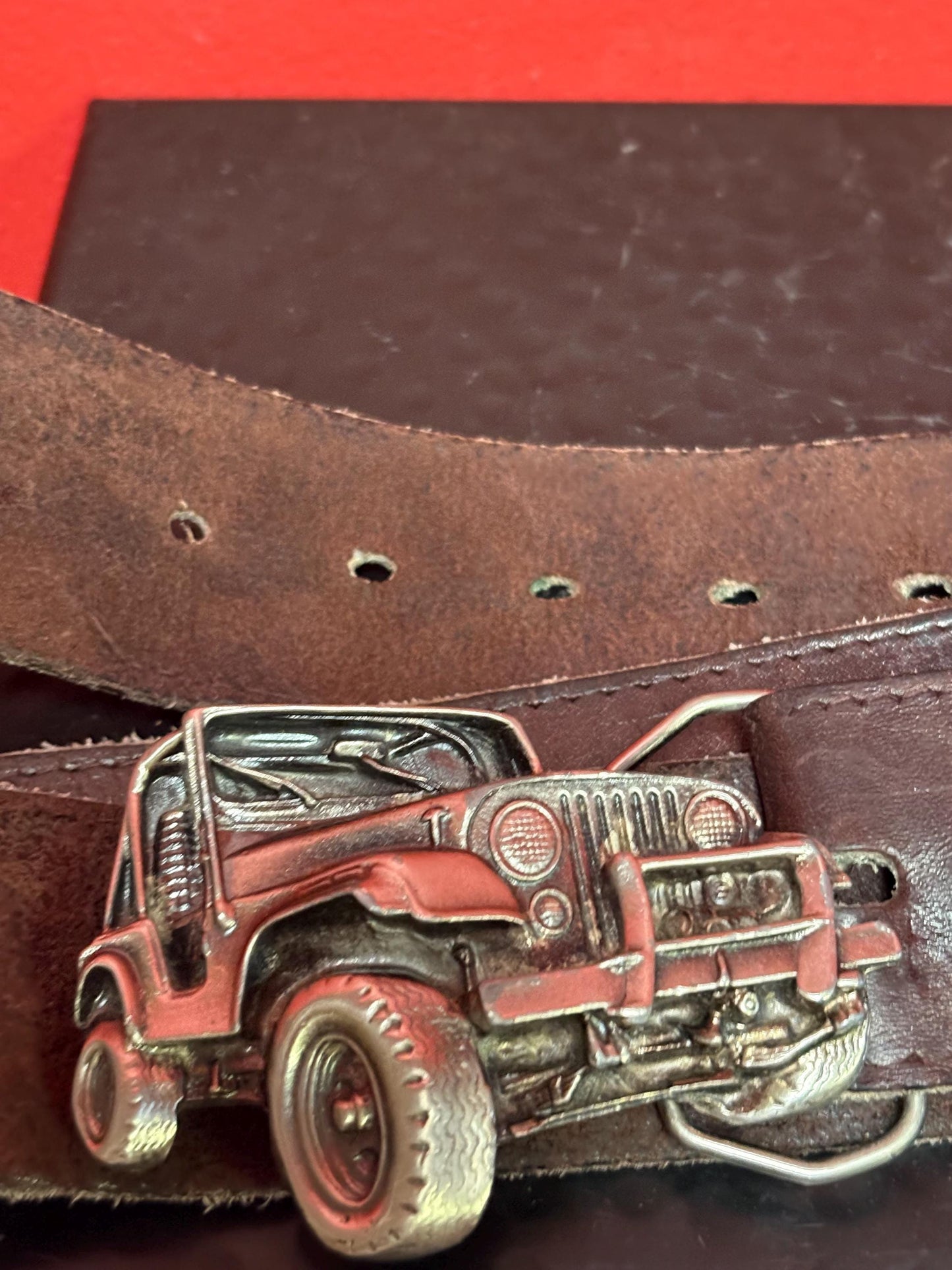Very cool American Jeep 3 inch belt buckle in heavy metal with approximately 40 inch long vintage leather belt