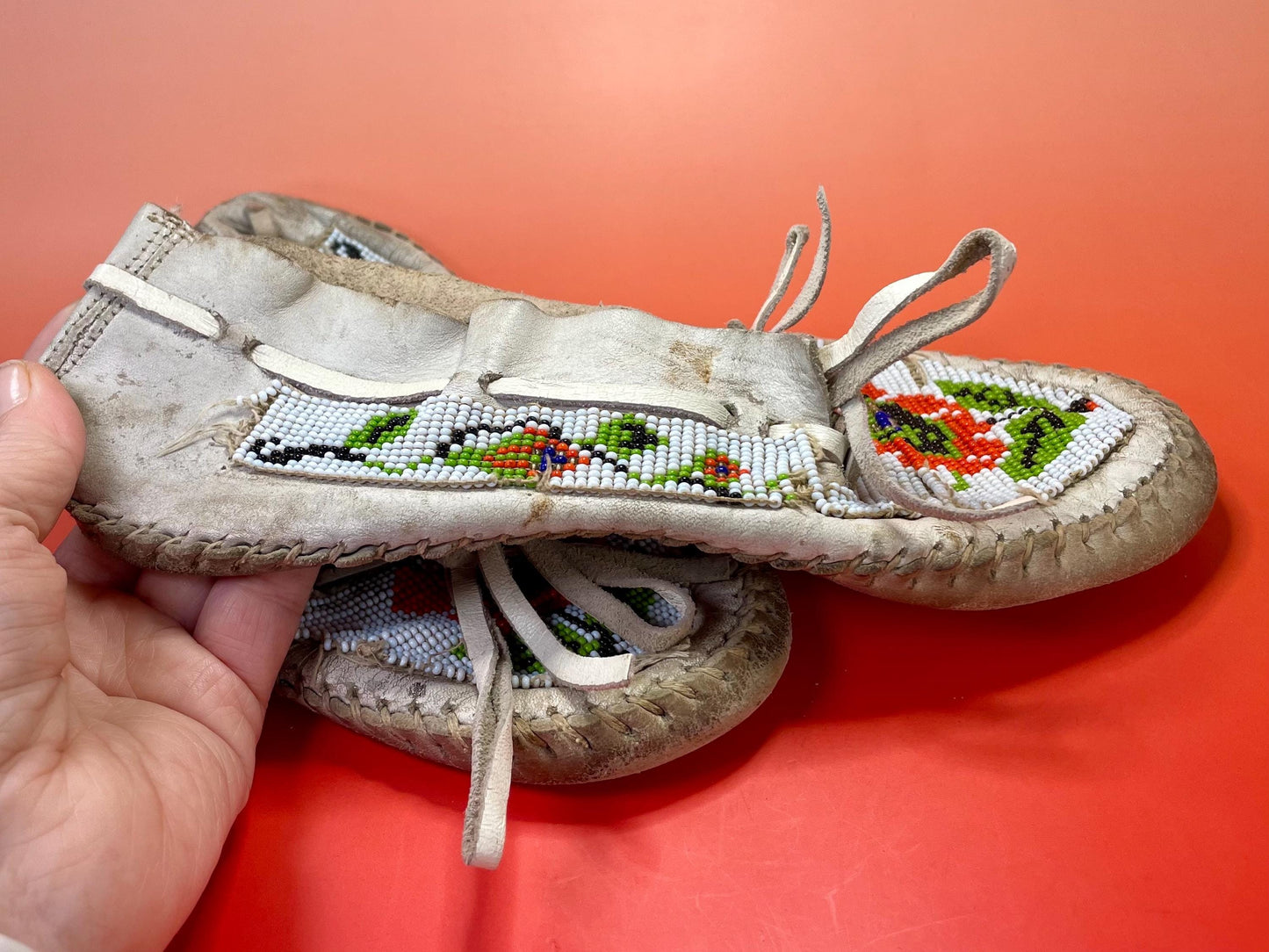 9.75 inch indigenous first nations antique leather and beaded moccasins  lovely design