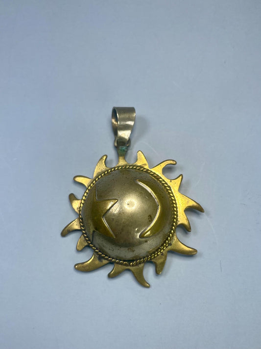 A Lovely Brass and Metal Musical pendant perfect gift