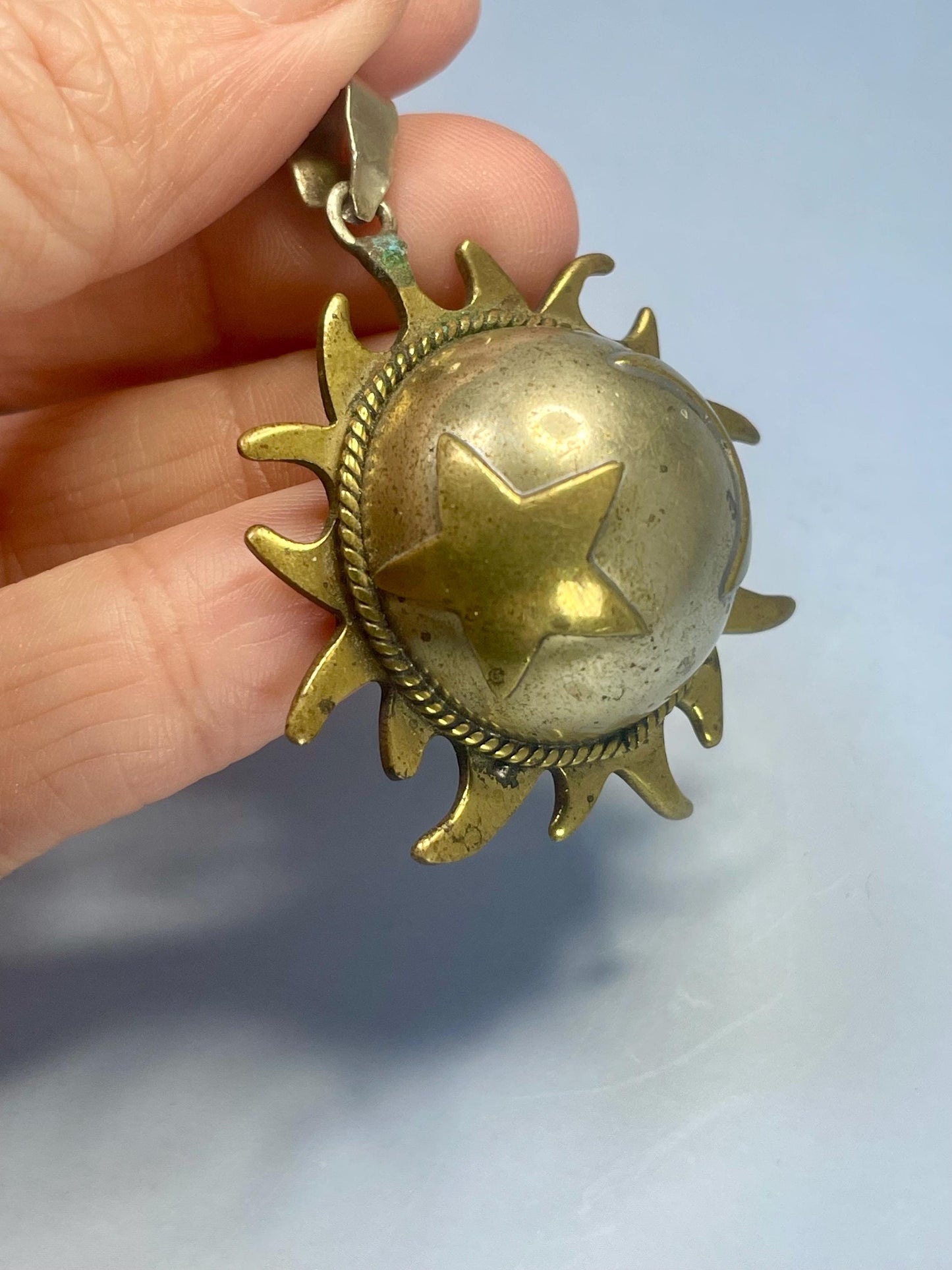 A Lovely Brass and Metal Musical pendant perfect gift