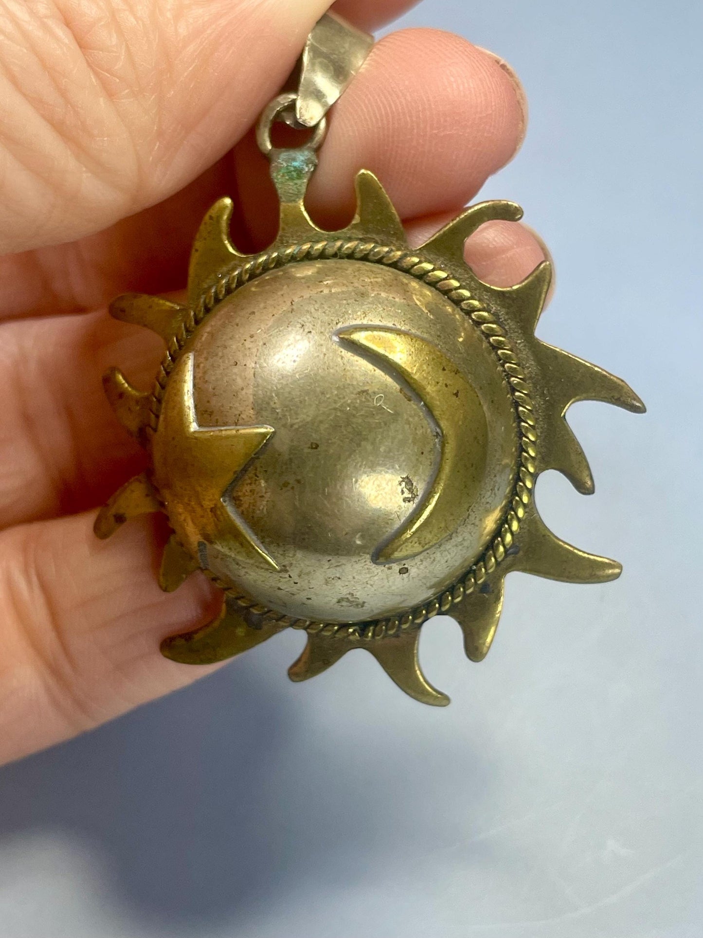 A Lovely Brass and Metal Musical pendant perfect gift