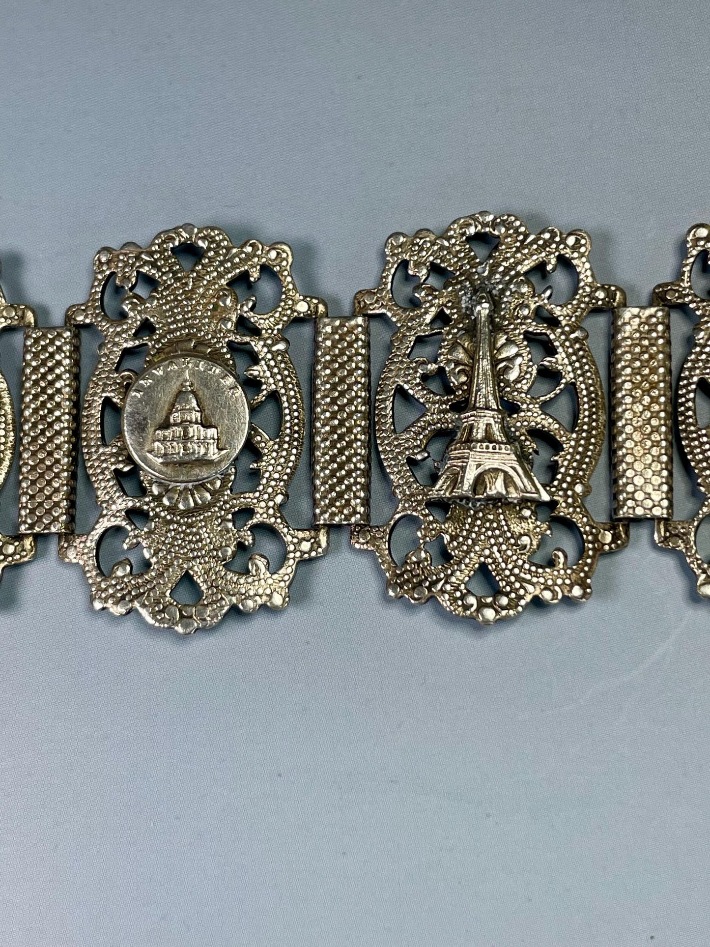 Classic Metal Link Bracelet with Parisian Imagery  Timeless and Versatile