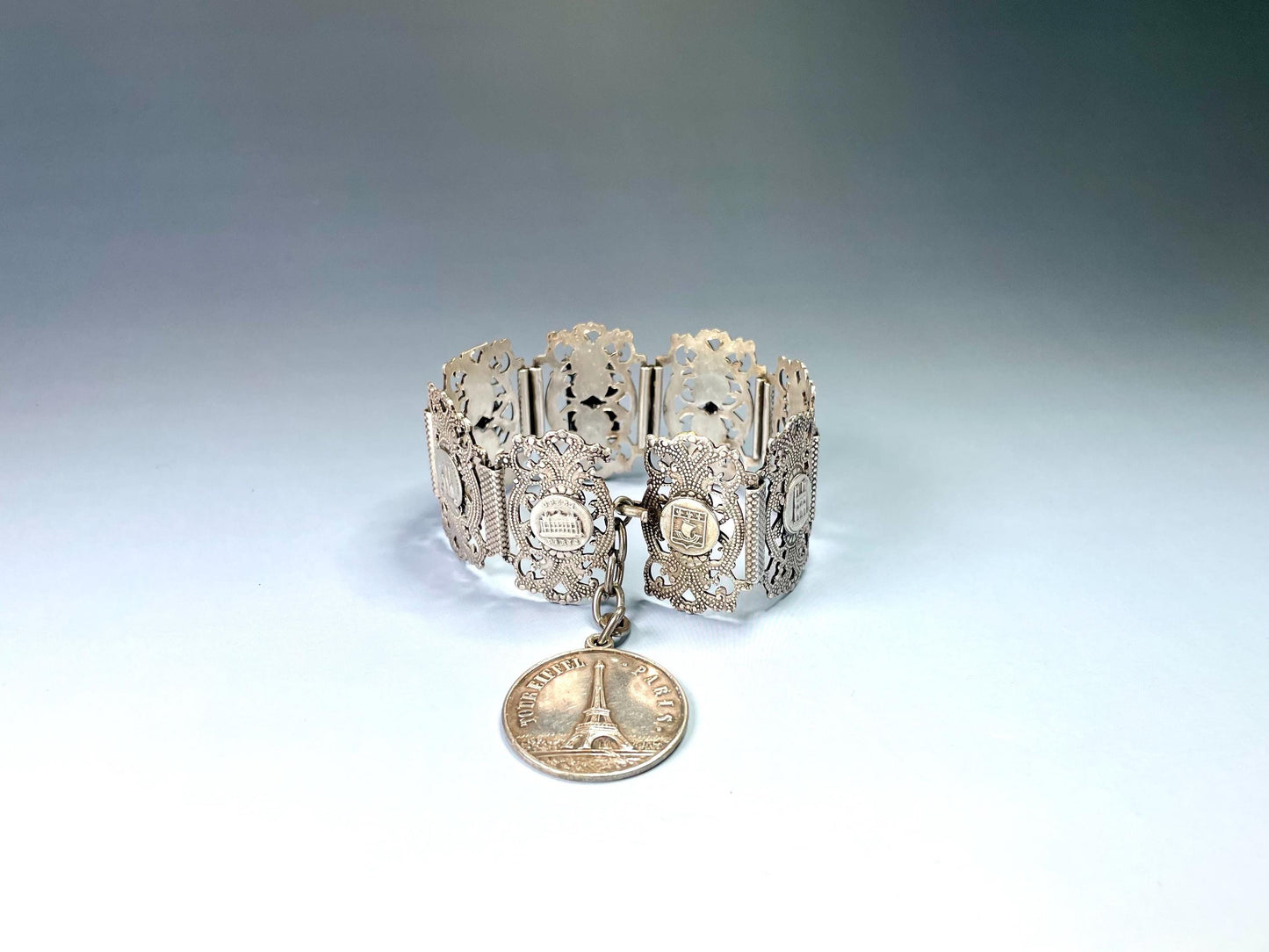 Classic Metal Link Bracelet with Parisian Imagery  Timeless and Versatile