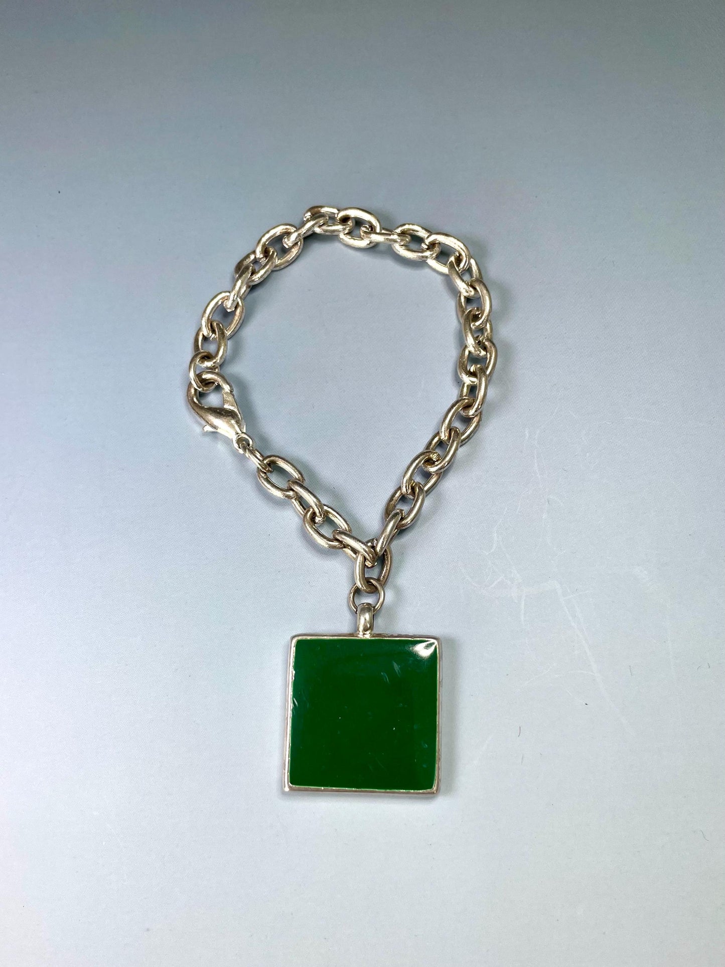 Classic Metal Link Bracelet with Large Black and Green Gem  Timeless and Versatile