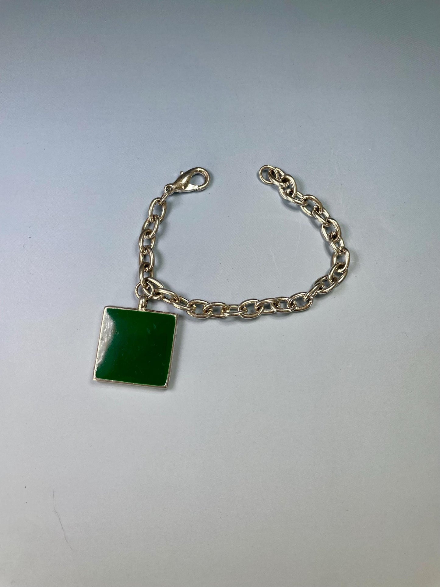 Classic Metal Link Bracelet with Large Black and Green Gem  Timeless and Versatile