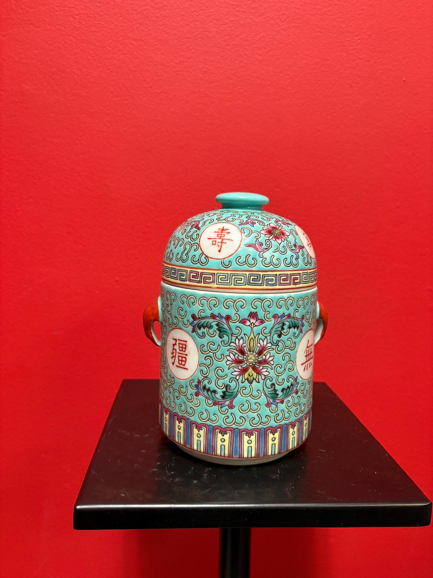 Lovely mid 20 century Chinese vert rose porcelain cannister with lovely handles  7 inches tall and good condition