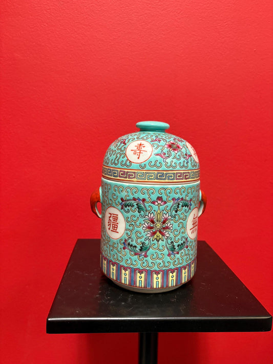 Lovely mid 20 century Chinese vert rose porcelain cannister with lovely handles  7 inches tall and good condition
