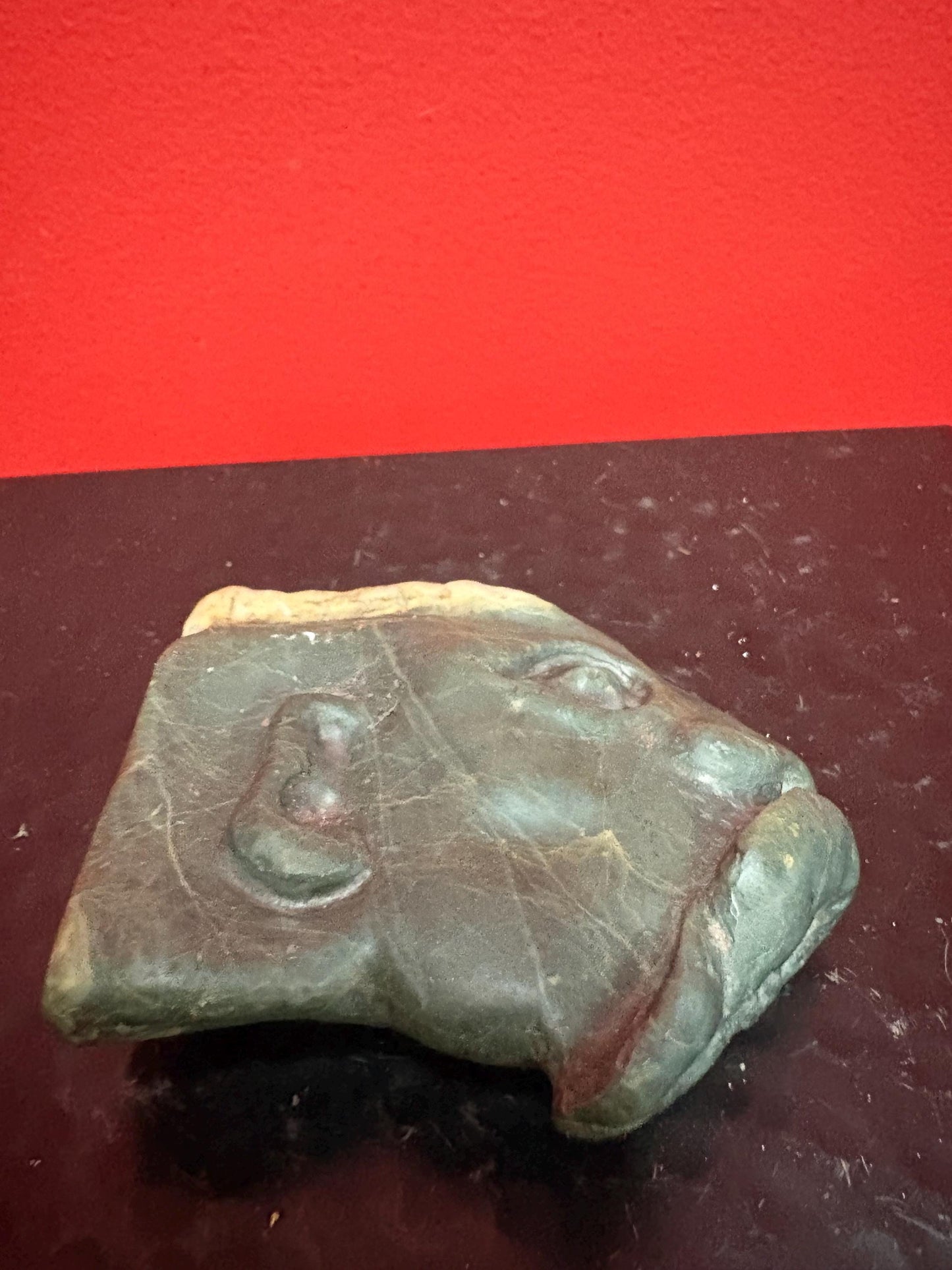 Mutton fat jade and spinach Jade 3 inch carved face  very cool and unusual - signed