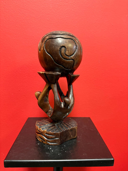 Lovely vintage African wooden statue of people holding up the world  9 inches tall  peaceful art sculpture