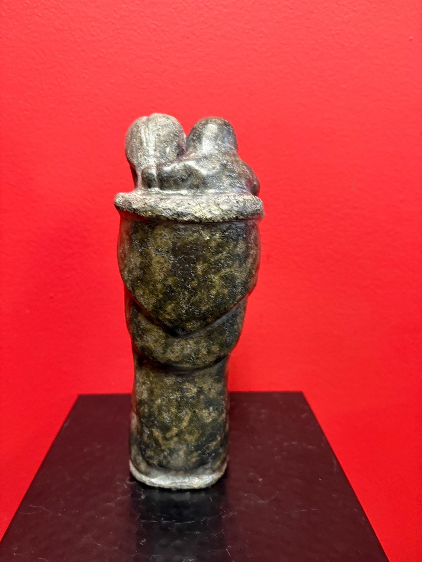 Fabulous signed indigenous Inuit  soapstone statue of a man and child   9 inches tall  great condition and detail  Inuit art