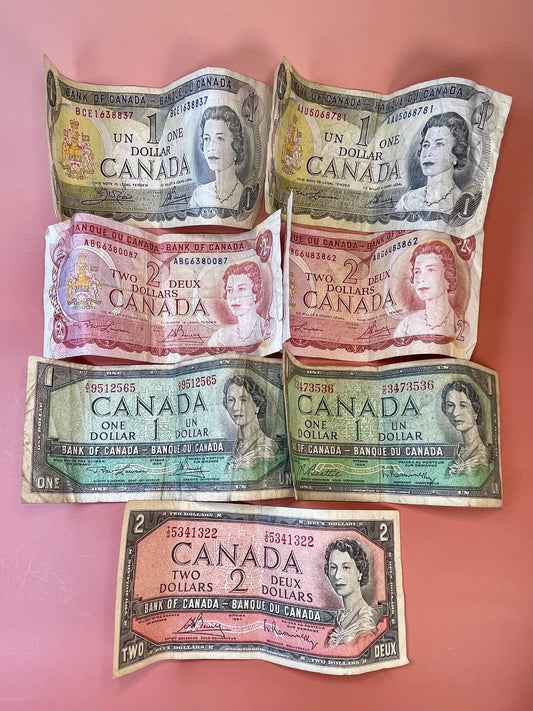 Old Canadian currency One and Two Dollar Bills