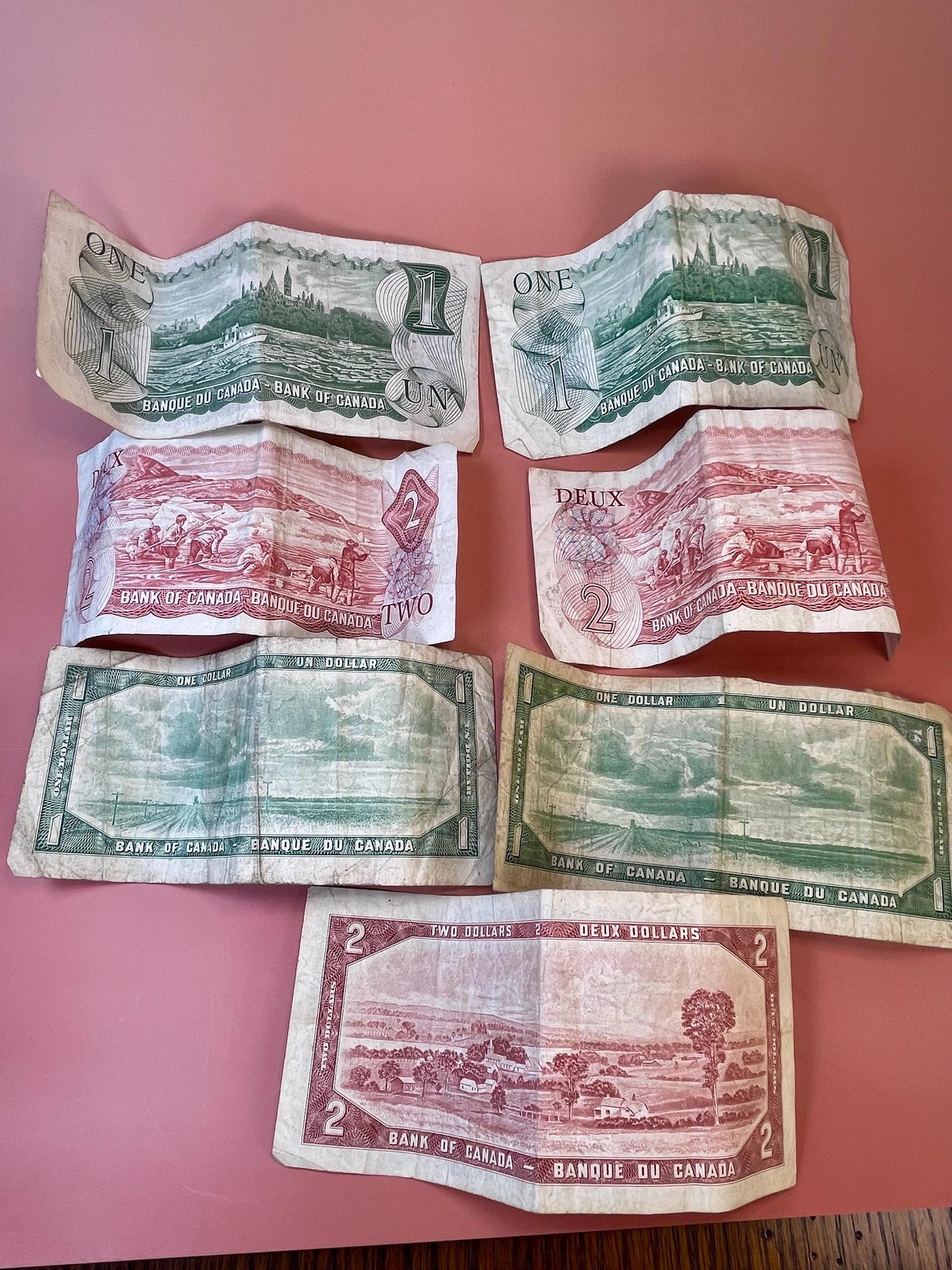 Old Canadian currency One and Two Dollar Bills