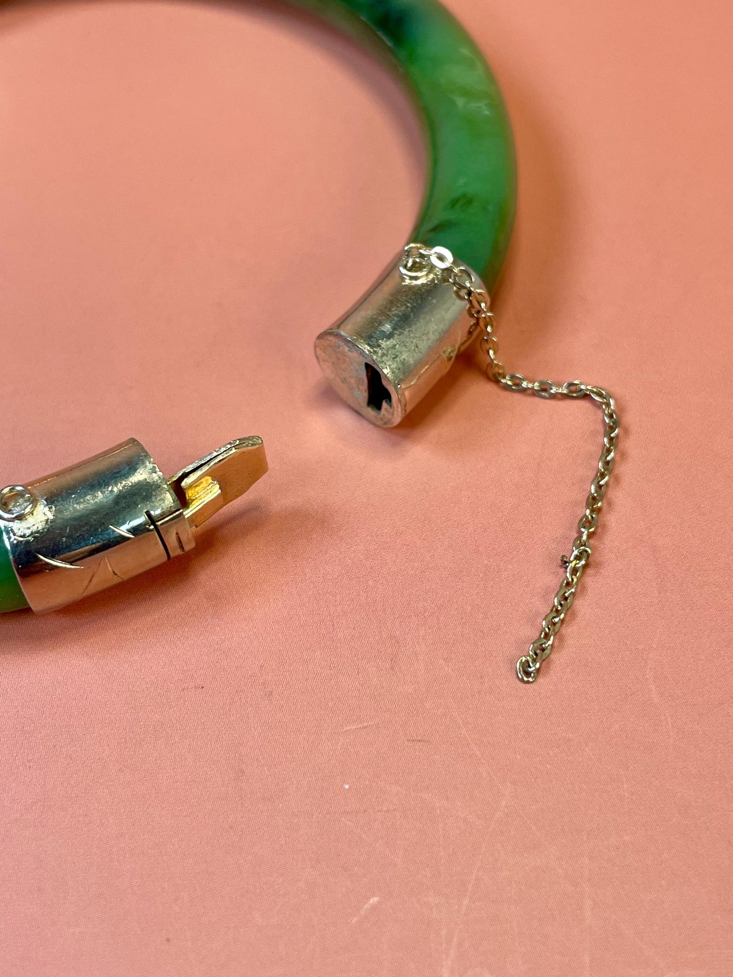 Lovely jade and gold toned bangle  value priced  2.5 inches inside