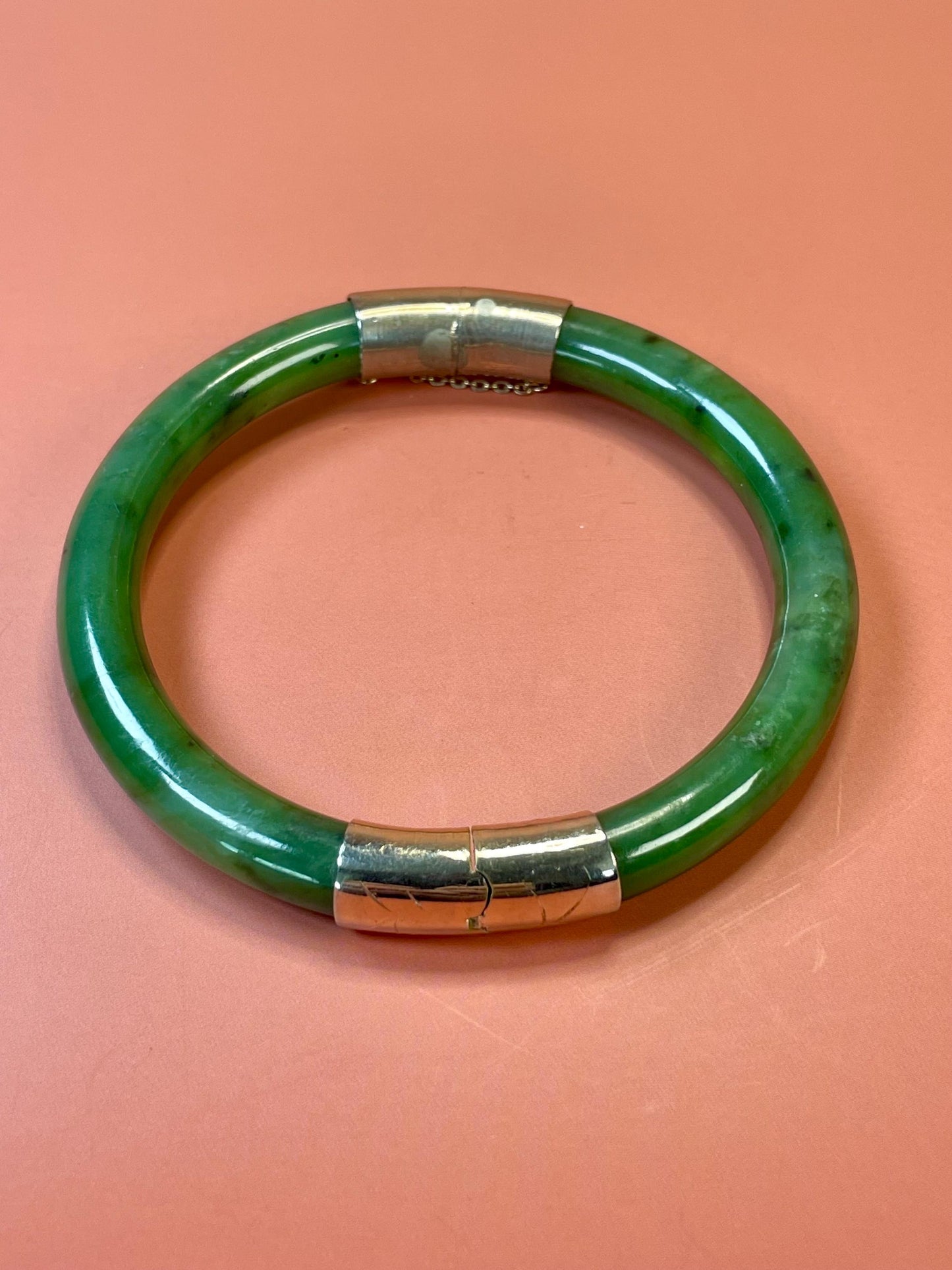 Lovely jade and gold toned bangle  value priced  2.5 inches inside