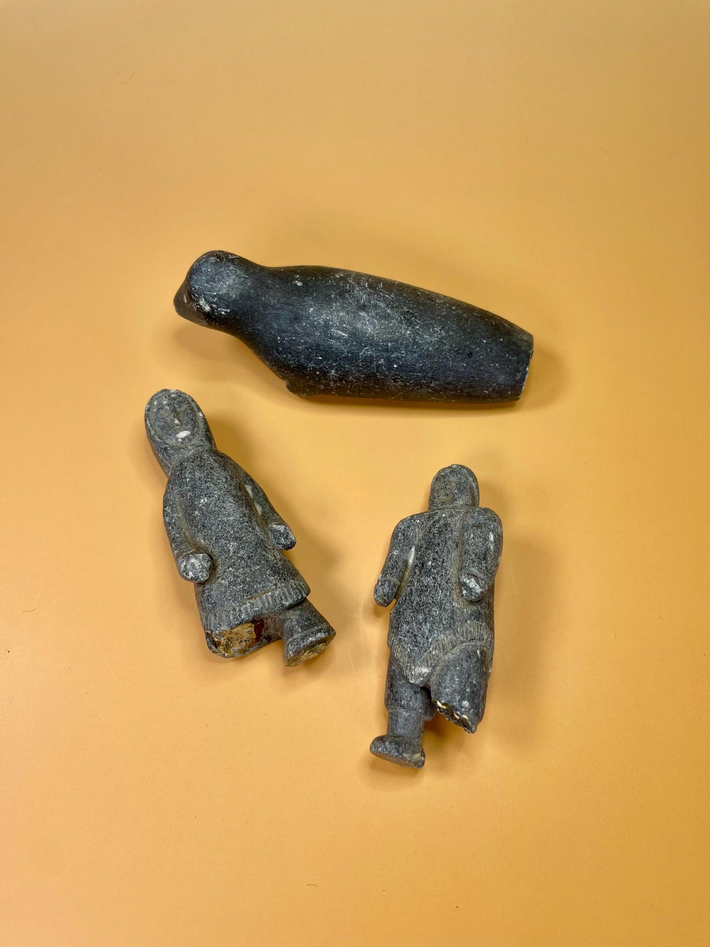 3 Indigenous Inuit soapstone carvings  all three broken, so see photos and priced low accordingly