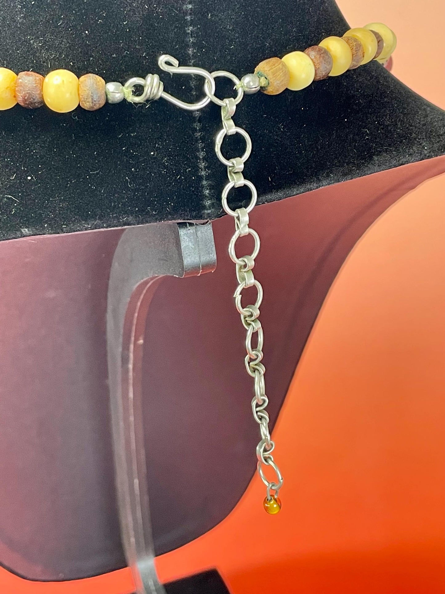 Lovely Beaded necklace  approximately 22 inches long  2.25 inch Metal Pendant