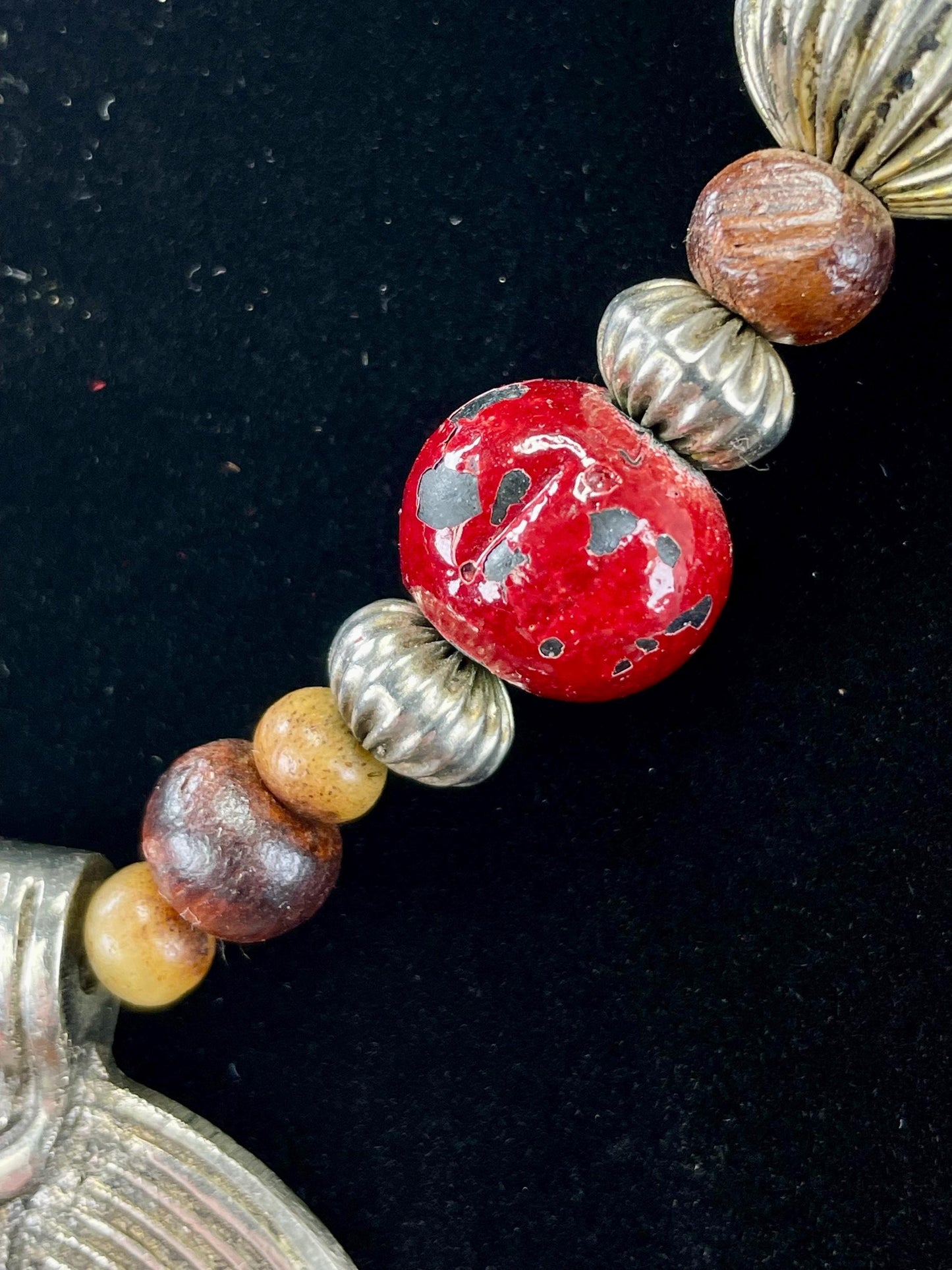 Lovely Beaded necklace  approximately 22 inches long  2.25 inch Metal Pendant