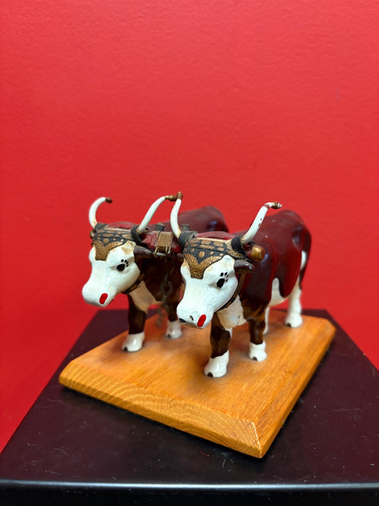Lovely antique heavy cast metal painted bulls on stand very cool  6 x 4 high  cowboy rancher heaven piece  say what!!