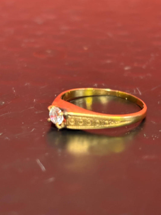 Lovely 14 K gold ring with one lovely diamond  elegant - size 9.25 - B -