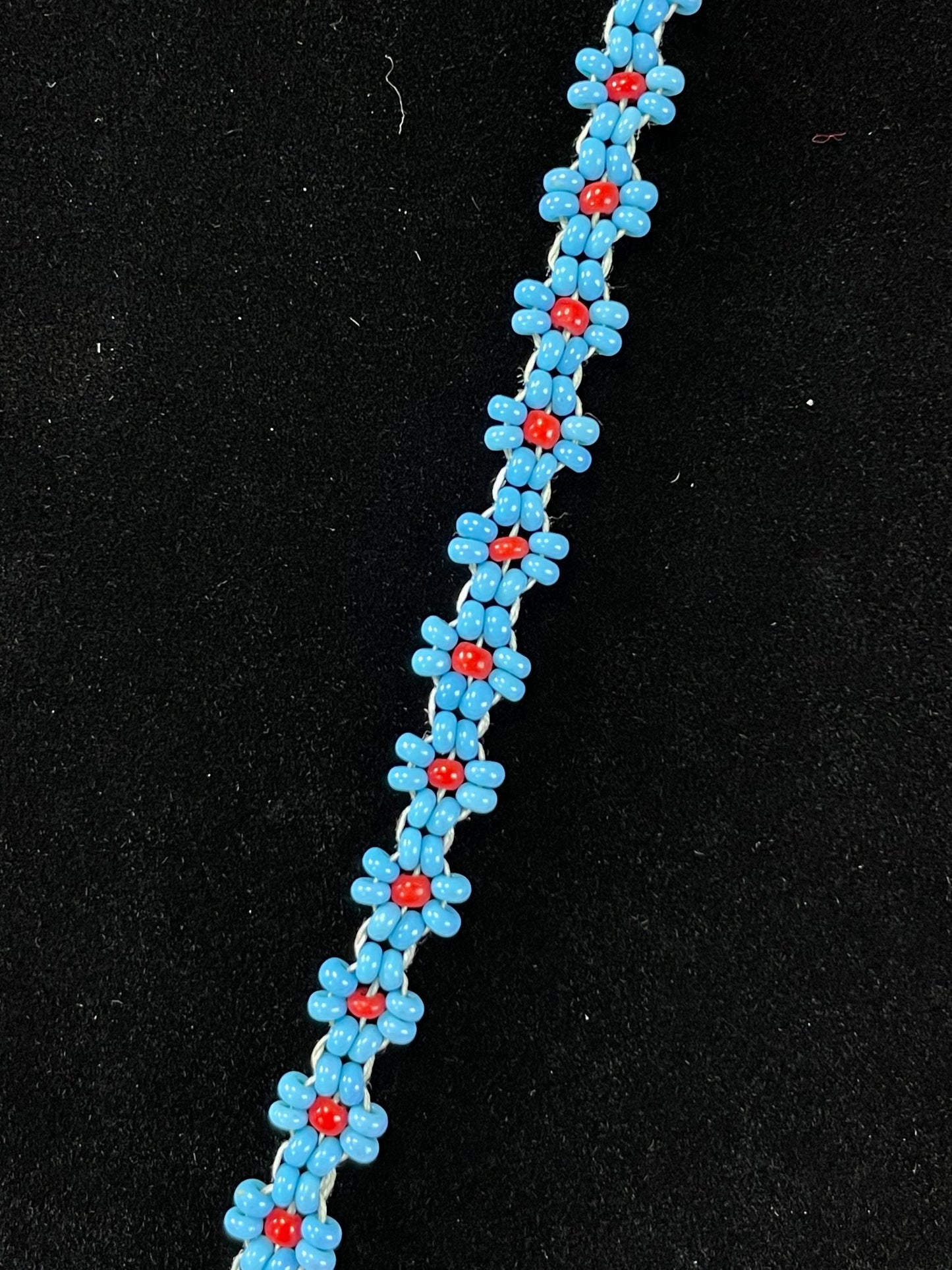 Beautiful approximately 22 inch long, indigenous first nations pacific northwest coast beaded necklace with tiny moccasins  great condition