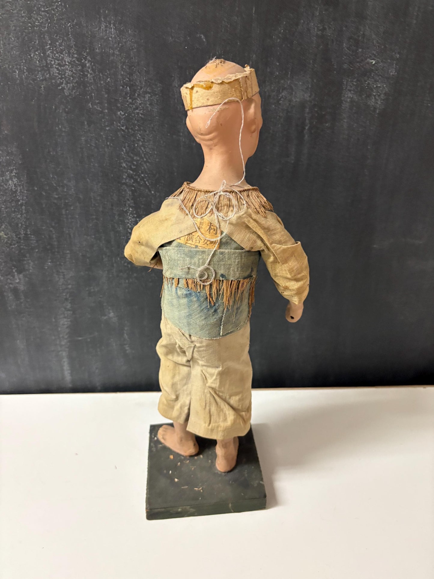 Stunning Chinese  18th century porcelain newspaper, straw and cloth statue of a man on wood stand  wow - 15 inches tall