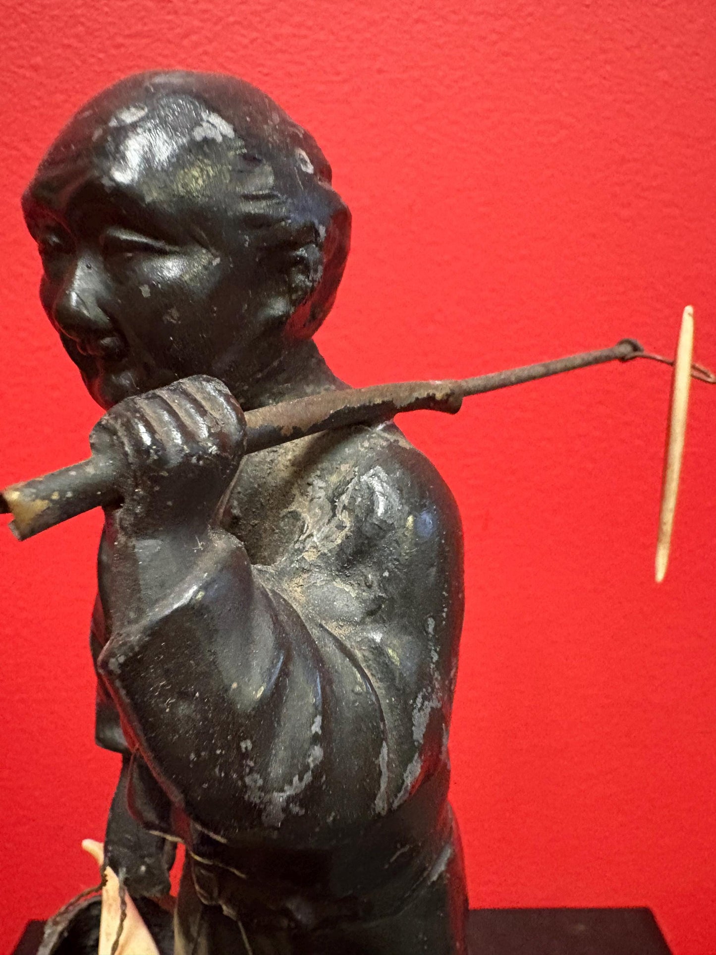 Antique Japanese bronze fisherman with bone fish  8.5 inches tall  see photos  lovely piece  great gift