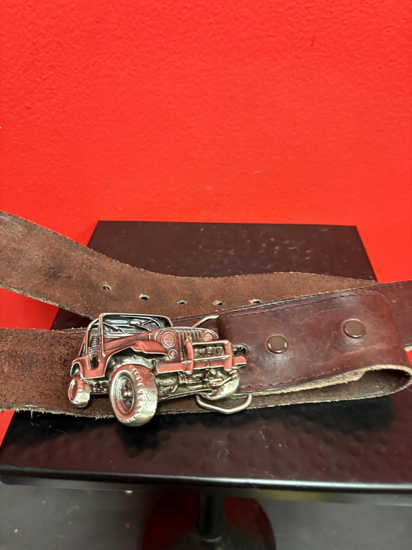 Very cool American Jeep 3 inch belt buckle in heavy metal with approximately 40 inch long vintage leather belt