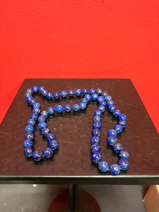 Amazing lapis necklace  wonderful colour and quality - great value  approximately 26 inches long wow