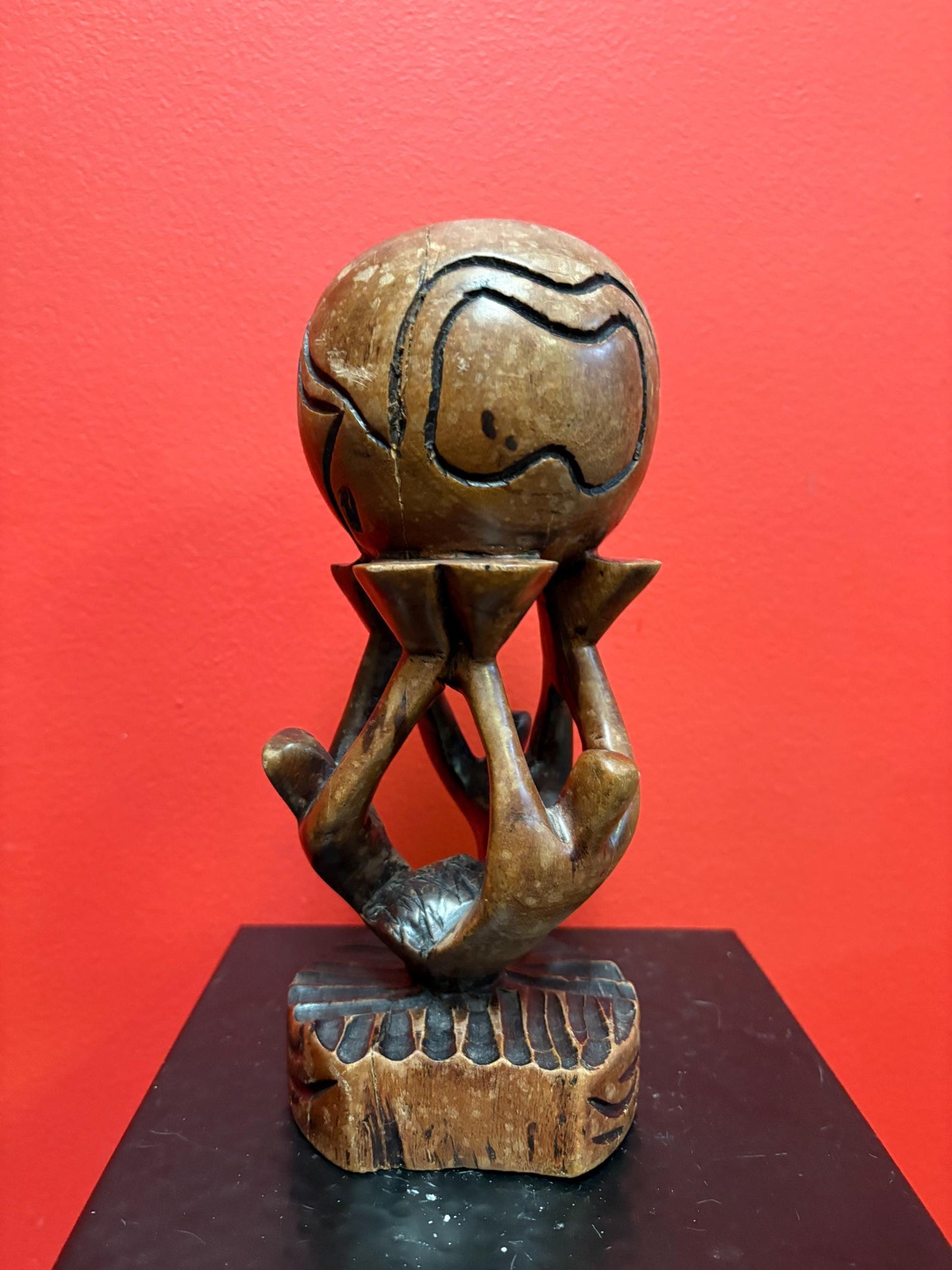 Lovely vintage African wooden statue of people holding up the world  9 inches tall  peaceful art sculpture