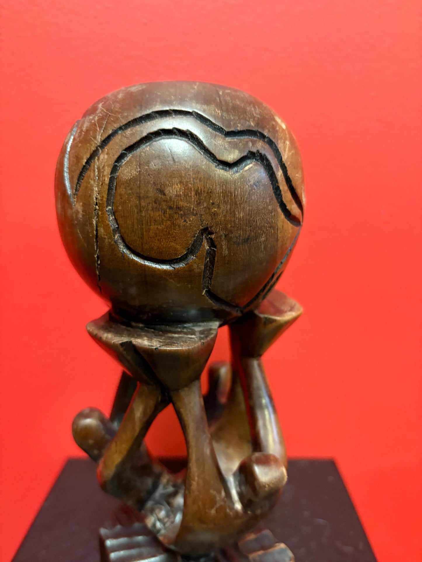 Lovely vintage African wooden statue of people holding up the world  9 inches tall  peaceful art sculpture