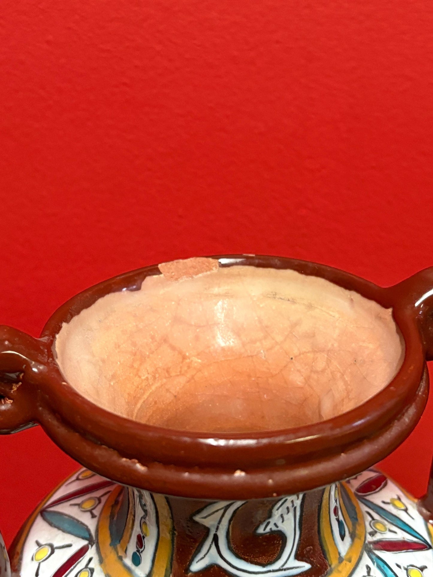 Beautiful African pottery vase  8.5 inches tall  bought in Africa in 1965  one chip  great shape and colours