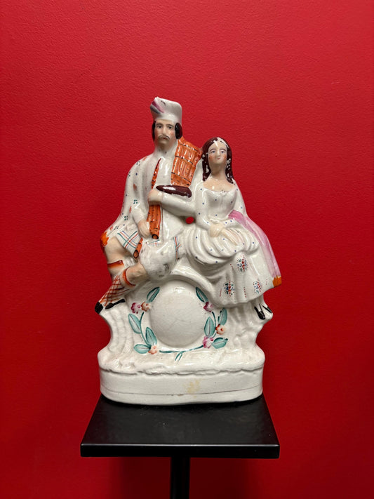 Beautiful antique English Staffordshire flatback statue of a couple  14 x 8 wide  good condition for age